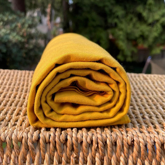 Tela de jersey elástica de bambú amarillo dorado cortada a medida o al por mayor